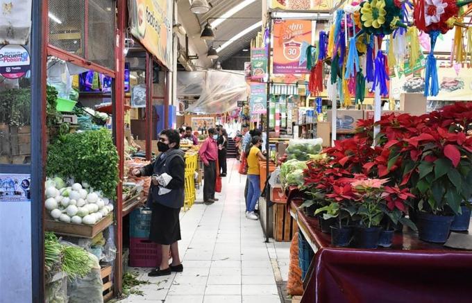 A comprar en mercados locales para afrontar la cuesta de enero
