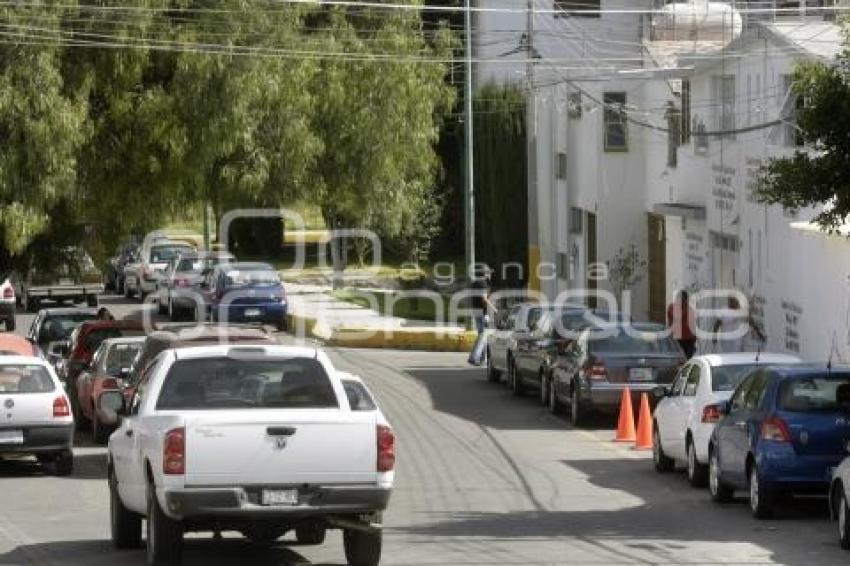 CALLE CONVERTIDA EN ESTACIONAMIENTO