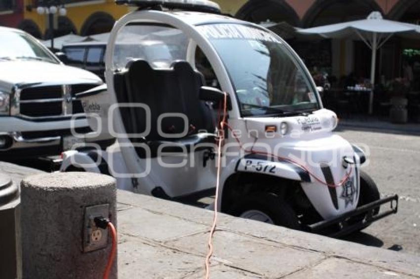 POLICÍA MUNICIPAL. CARRO ELÉCTRICO