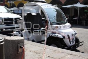 POLICÍA MUNICIPAL. CARRO ELÉCTRICO