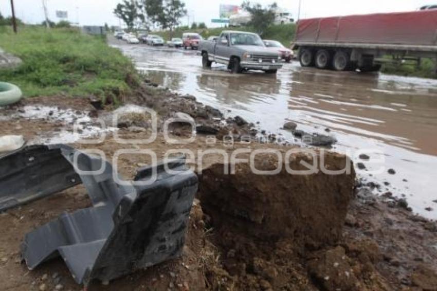 LLUVIAS . INUNDACIÓN LATERAL AUTOPISTA