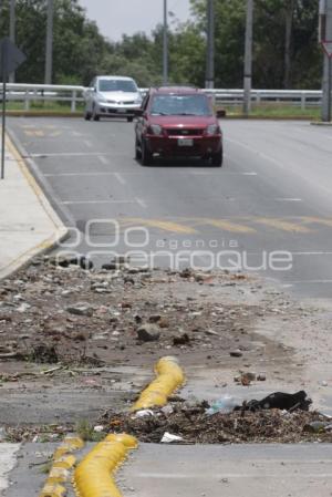 BASURA EN LAS COLADERAS. CAMINO REAL