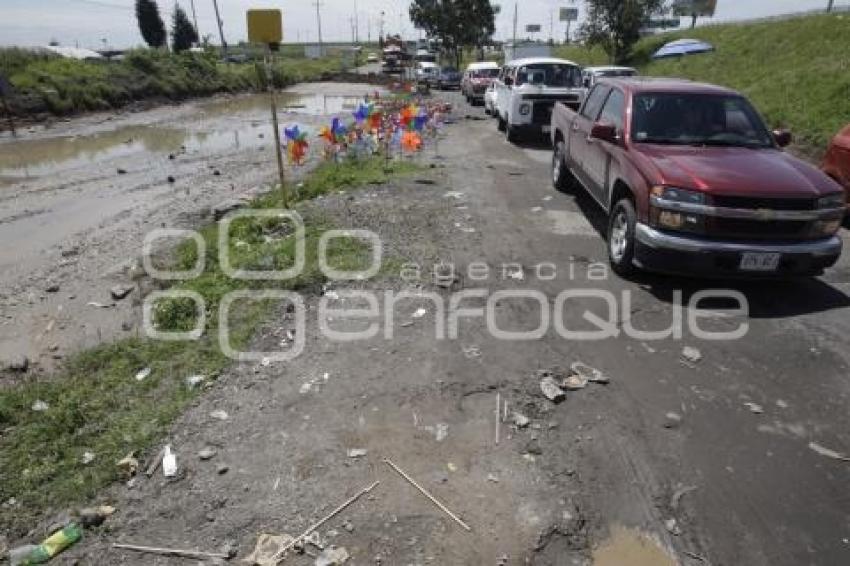 BACHE . LATERAL AUTOPISTA