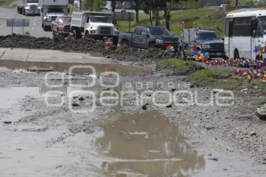 BACHE . LATERAL AUTOPISTA