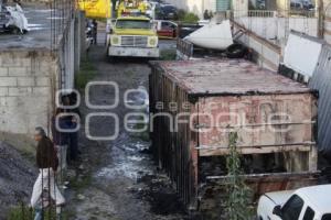 INCENDIO EN LOTE DE AUTOS