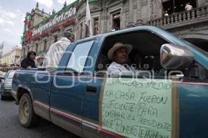 MANIFESTACIÓN . JUAN C. BONILLA