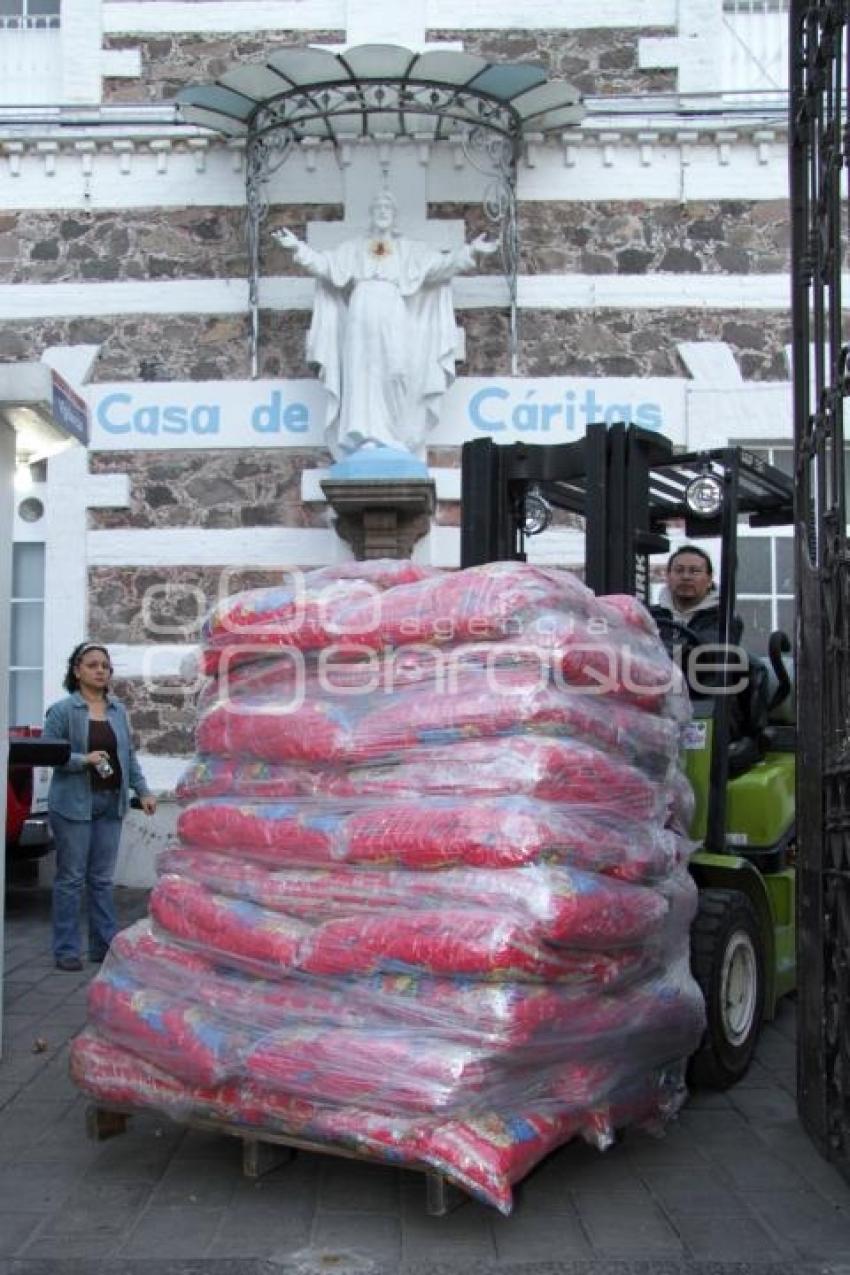 CARGAN VIVERES RUMBO A VERACRUZ  -  CASA DE CÁRITAS