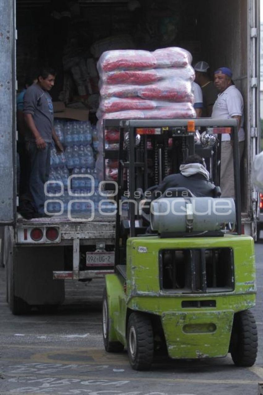 CARGAN VIVERES RUMBO A VERACRUZ  -  CASA DE CÁRITAS