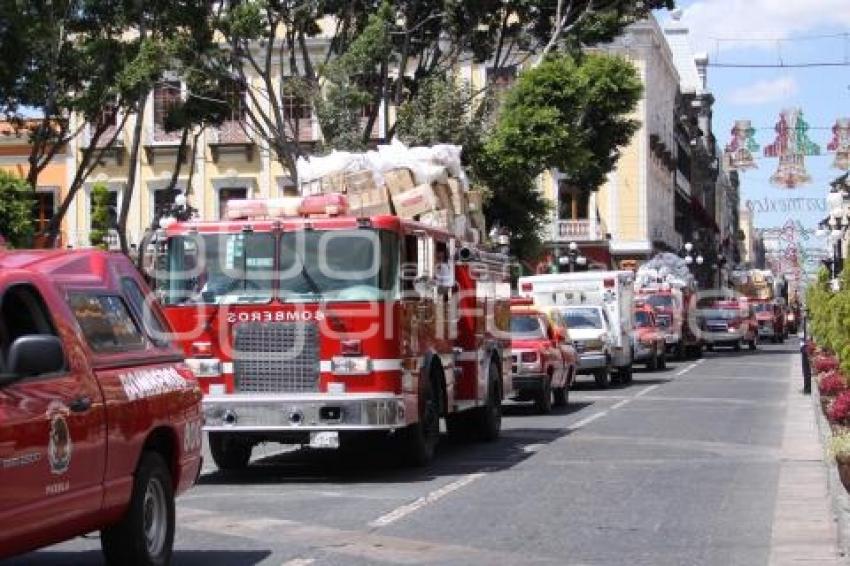 DESFILE DE BOMBEROS CON VÍVERES PARA DAMNIFICADOS