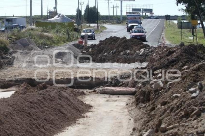 BACHE. LATERAL AUTOPISTA