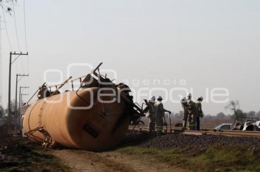 VOLCADURA DE DOS VAGONES DE UN TREN