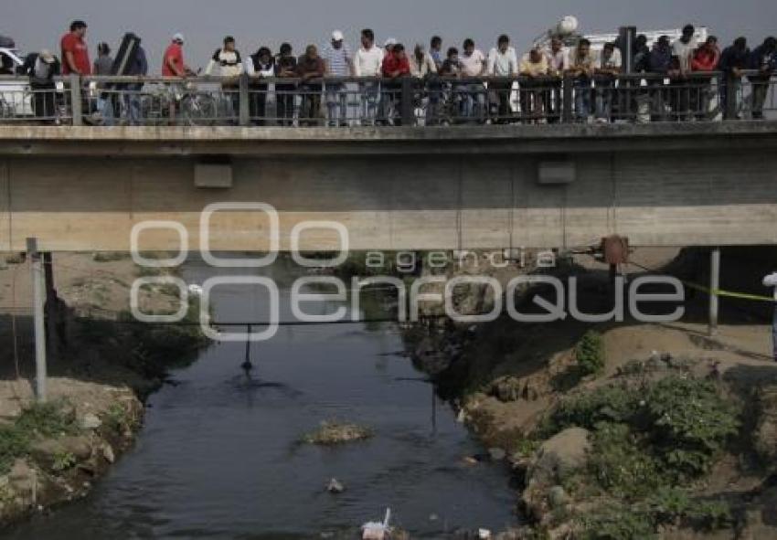 ENCUENTRAN CADAVER DE UN HOMBRE ENTRE LAS AGUAS NEGRAS DEL RIO