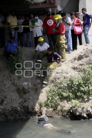 ENCUENTRAN CADAVER DE UN HOMBRE ENTRE LAS AGUAS NEGRAS DEL RIO