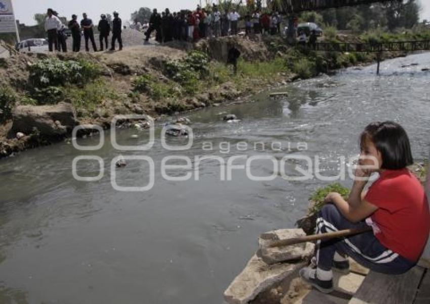 ENCUENTRAN CADAVER DE UN HOMBRE ENTRE LAS AGUAS NEGRAS DEL RIO
