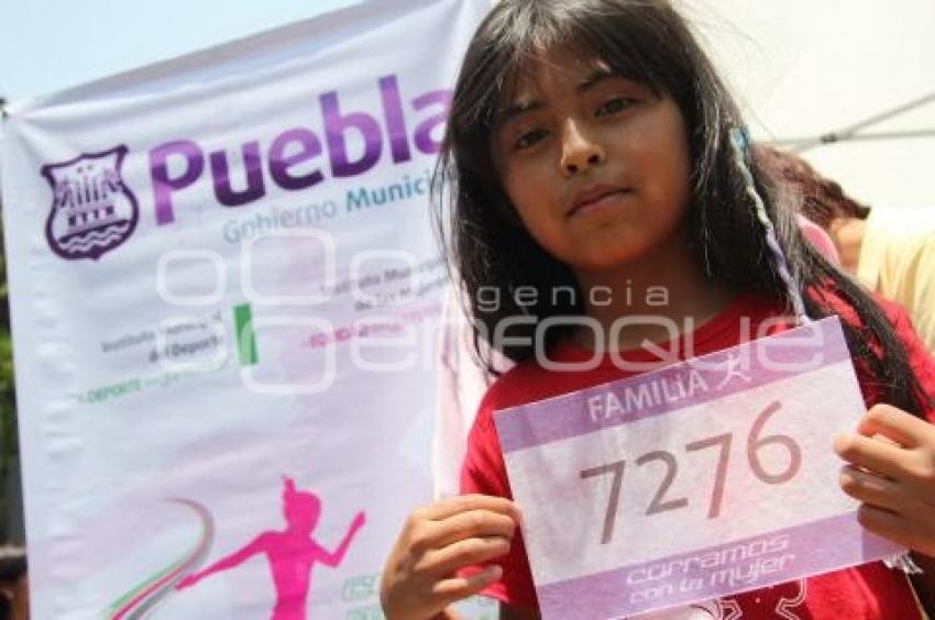 CORRAMOS POR LA MUJER