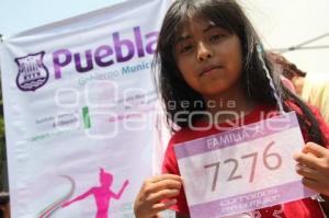CORRAMOS POR LA MUJER
