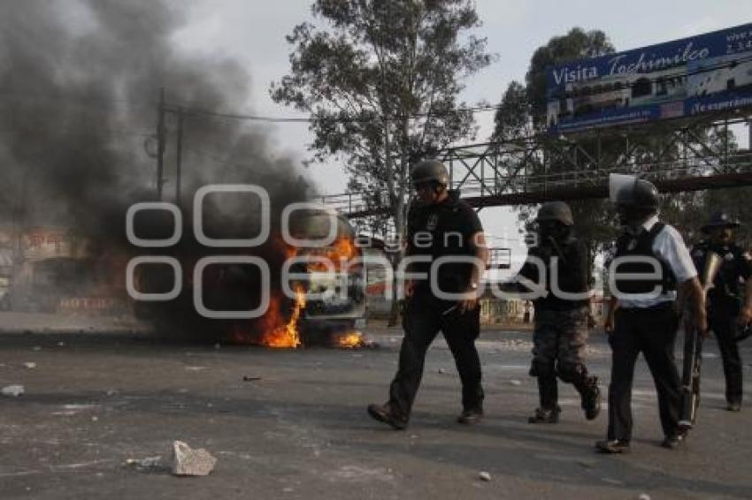 INCENDIAN TRANSPORTE PUBLICO EN FEDERAL ATLIXCO