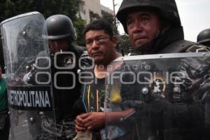 ENFRENTAMIENTO - POLICIAS - COMERCIANTES