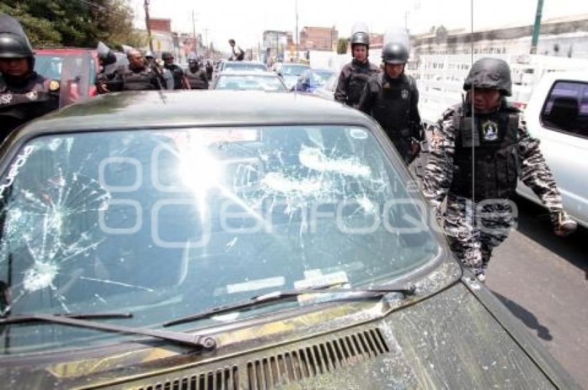 ENFRENTAMIENTO - POLICIAS - COMERCIANTES