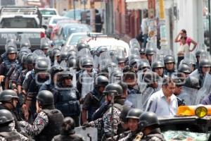 ENFRENTAMIENTO - POLICIAS - COMERCIANTES