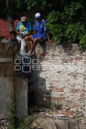 CAE JOVEN A BARRANCA EN ZARAGOZA