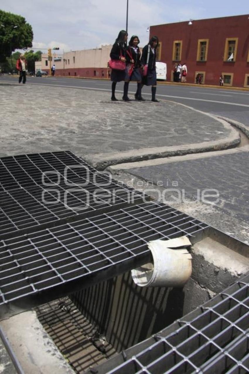 ALCANTARILLA SIN TAPA
