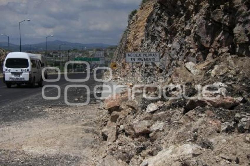 PIEDRAS SOBRE PERIFERICO ECOLOGICO