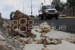 PIEDRAS SOBRE PERIFERICO ECOLOGICO