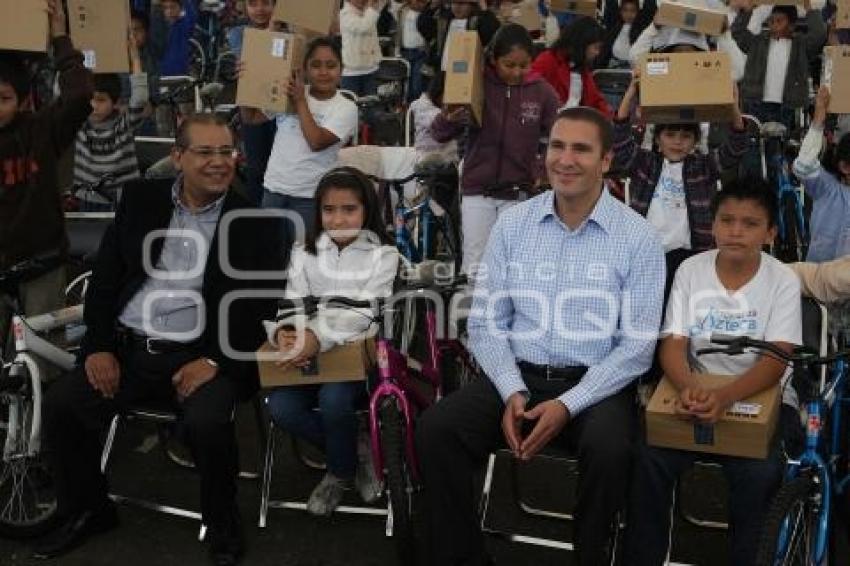 GOBIERNO . COMPUTADORAS Y BICICLETAS