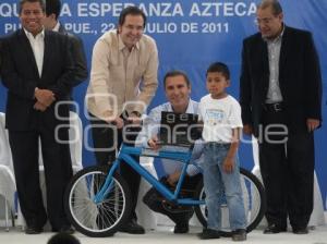 GOBIERNO . COMPUTADORAS Y BICICLETAS
