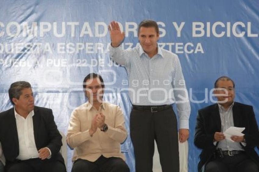 GOBIERNO . COMPUTADORAS Y BICICLETAS