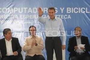 GOBIERNO . COMPUTADORAS Y BICICLETAS