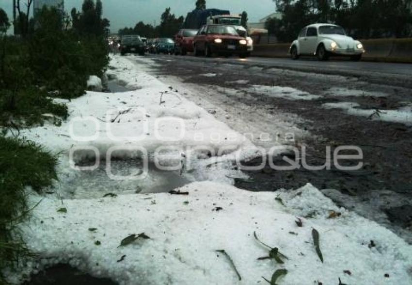 LLUVIAS . GRANIZO