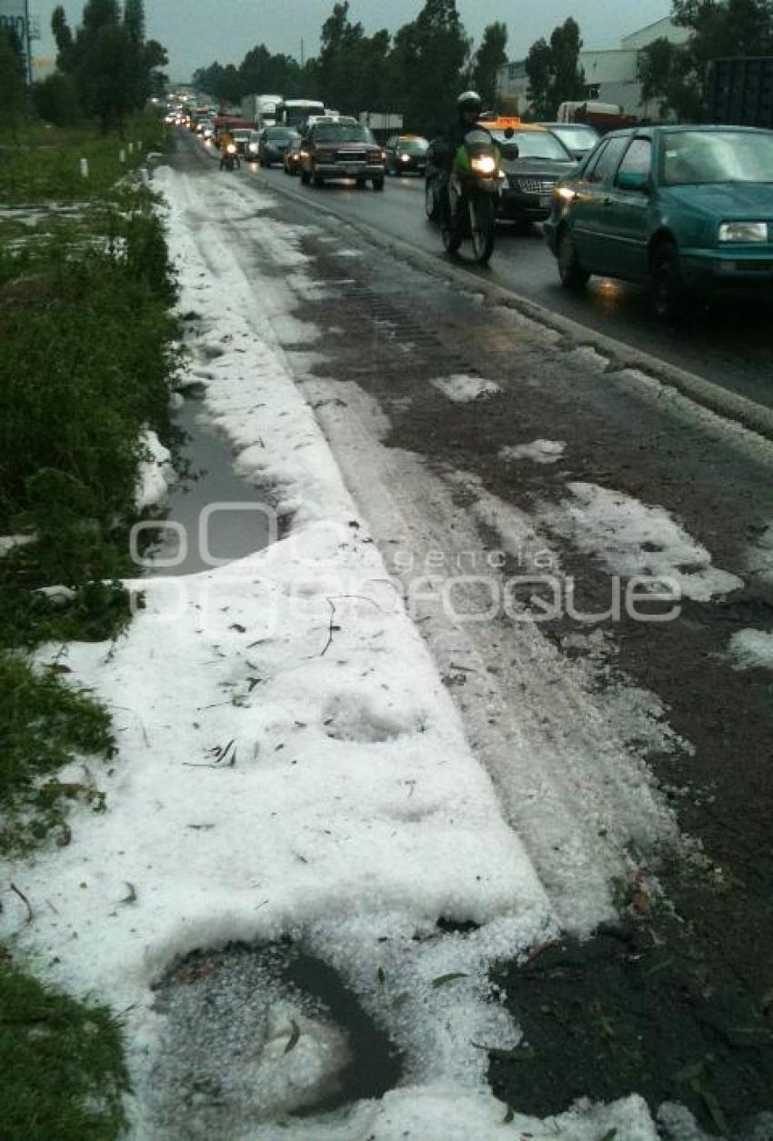 LLUVIAS . GRANIZO