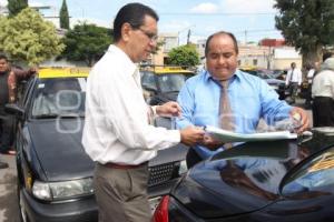 REVISTA VEHICULAR A TAXIS