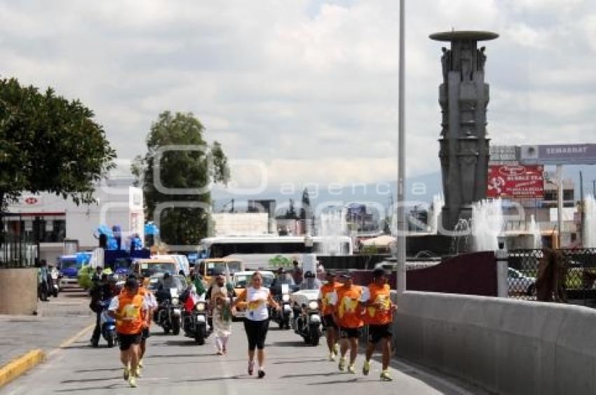 LA ANTORCHA DE LOS XVI JUEGOS PANAMERICANOS GUADALAJARA 2011 RECORRE LAS CALLES DE LA CAPITAL POBLANA.