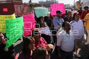 MANIFESTACIÓN . BACHES