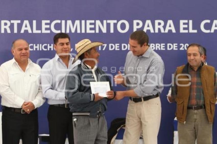 ENTREGA DE APOYOS ECONOMICOS A CAMPESINOS DE TLACHICHUCA