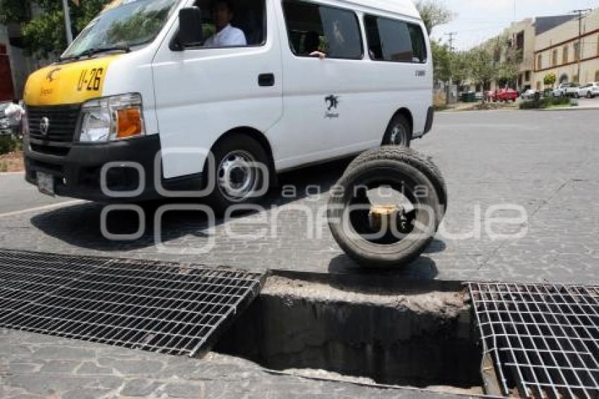 COLADERA DESTAPADA EN LA 14 OTE