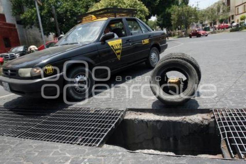 COLADERA DESTAPADA EN LA 14 OTE