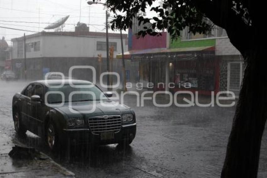 CAE LLUVIA INTENSA EN PUEBLA