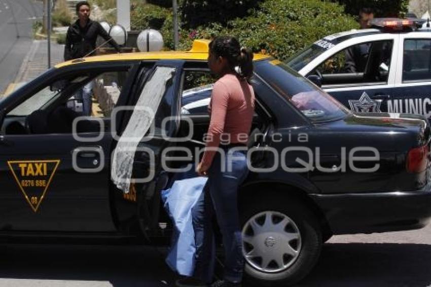 FALLECE MENOR ABORDO DE TAXI