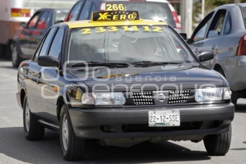 TRANSPORTE . TAXIS