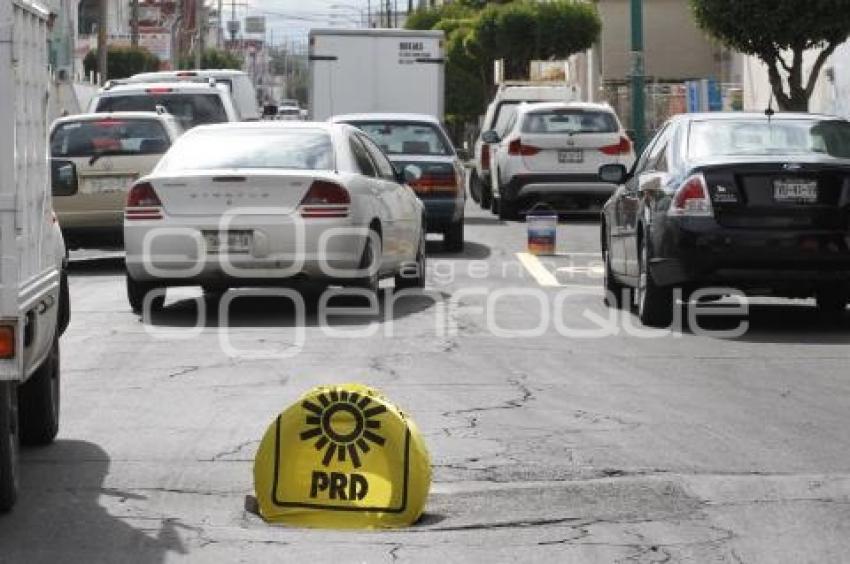 CUBREN BACHE CON PLAYERA DEL PRD