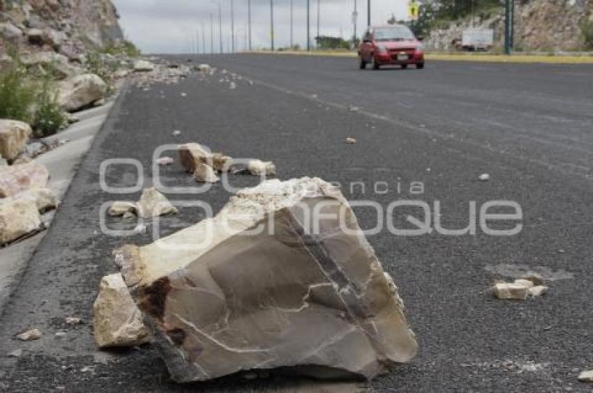 PIEDRAS SOBRE PERIFÉRICO ECOLÓGICO