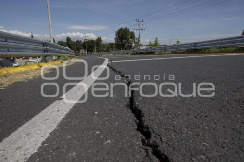 GRIETA . PUENTE UDLA