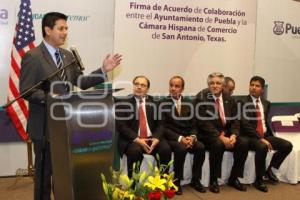 FIRMA CONVENIO AYUNTAMIENTO PUEBLA CAMARA COMERCIO SAN ANTONIO TEXAS