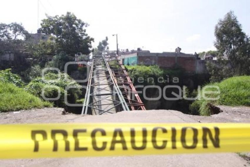 CAE PUENTE PEATONAL.JOAQUIN COLOMBRES