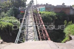 CAE PUENTE PEATONAL.JOAQUIN COLOMBRES