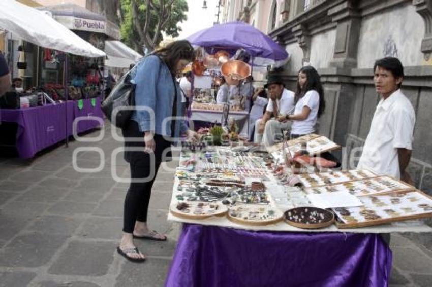 PUEBLA SE PONE MORADO